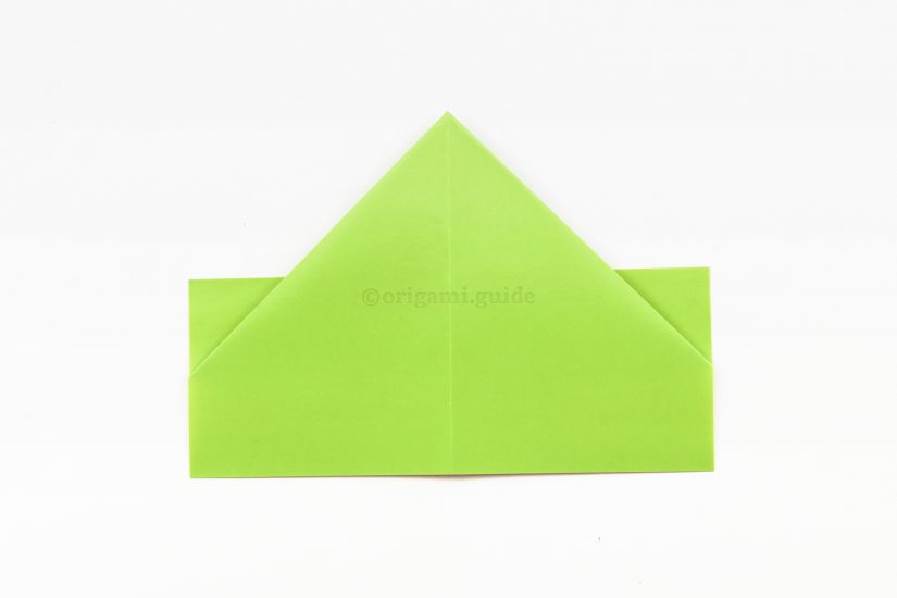8. Flip your origami hat over to the other side.