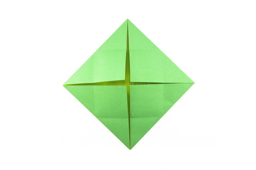 14. Fold the other three corners in to the center.
