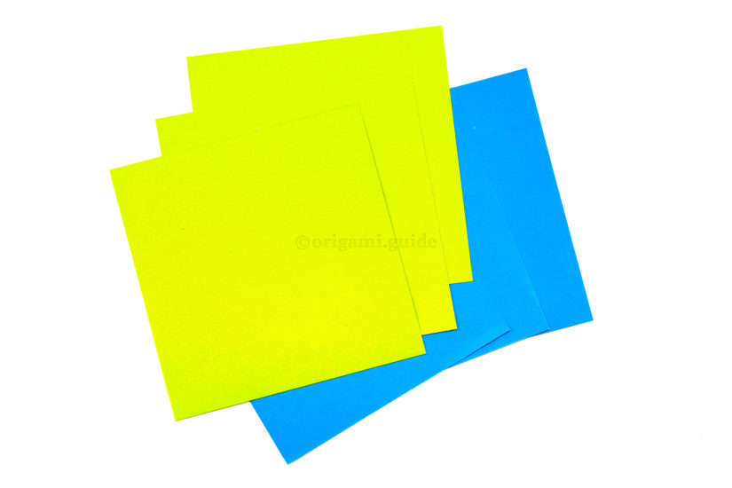 1. Get 6 sheets of square paper, they can be any size. Here we have paper that is 7.5 x 7.5 cm