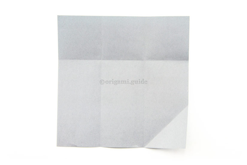 12. Unfold both the top and lower diagonal flap.