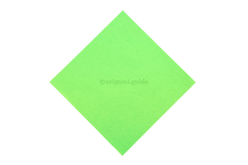 1. This is the front of the origami paper, our arrow will end up being this colour.