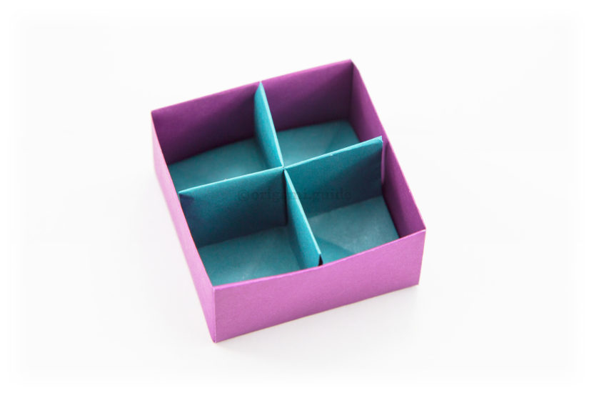 35. Now you place the divider inside your masu box. You have now completed the origami box divider.