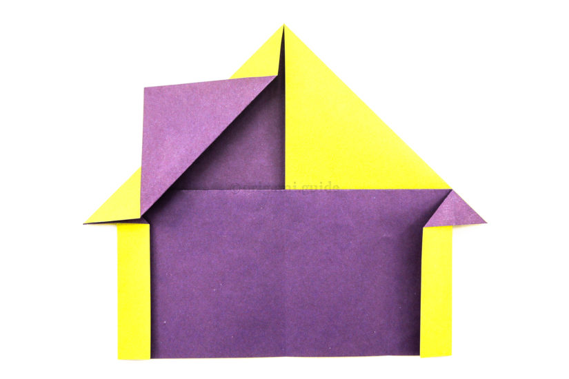 15. Fold the loose flip up diagonally to create a chimney.