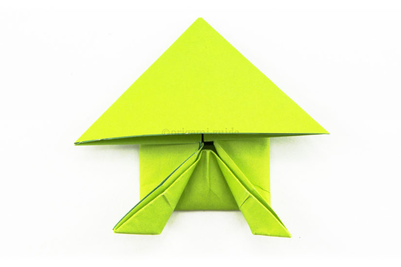 21. To make the frog's back legs, fold the points diagonally outwards.