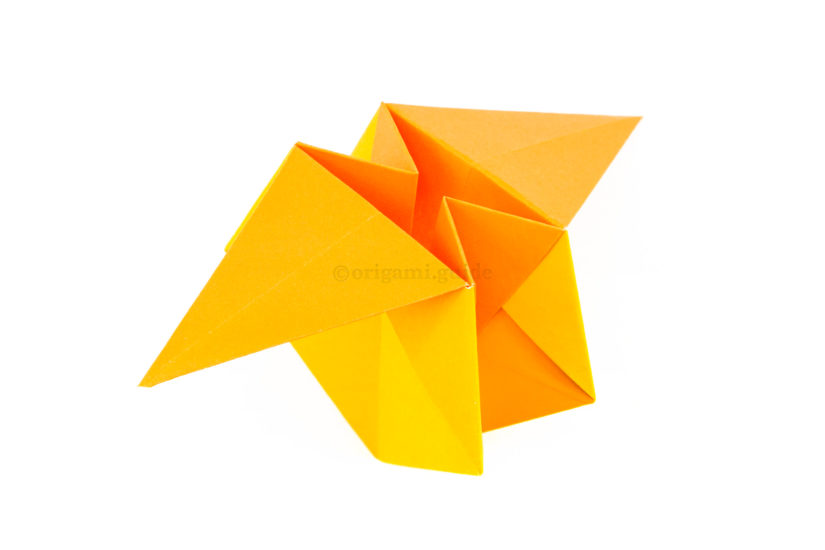 28. Open out the top of the origami star box.