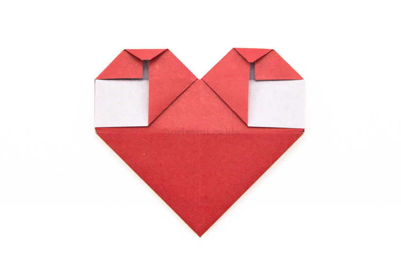 19. Fold the two top points of the heart down a little.