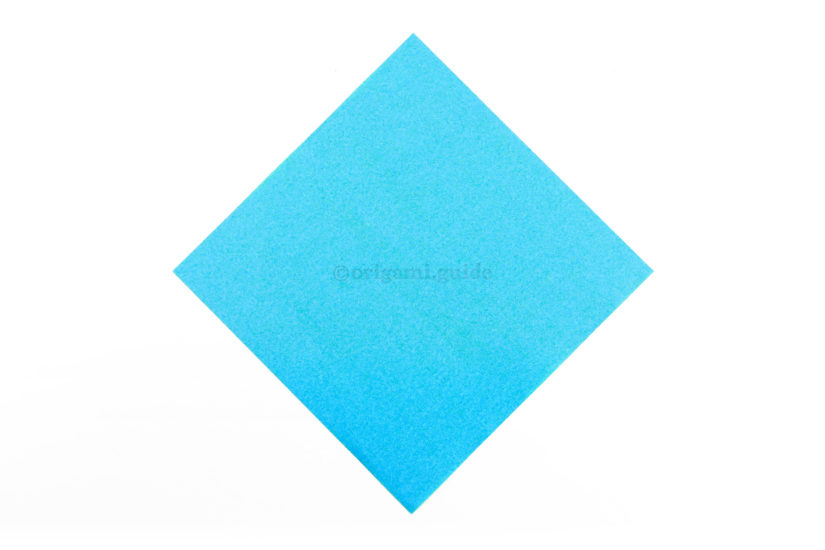 1. This is the front of our origami paper, the dove will end up being this colour.
