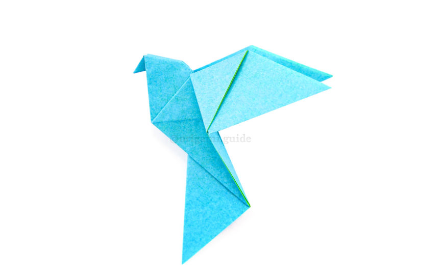 31. The origami dove is completed.