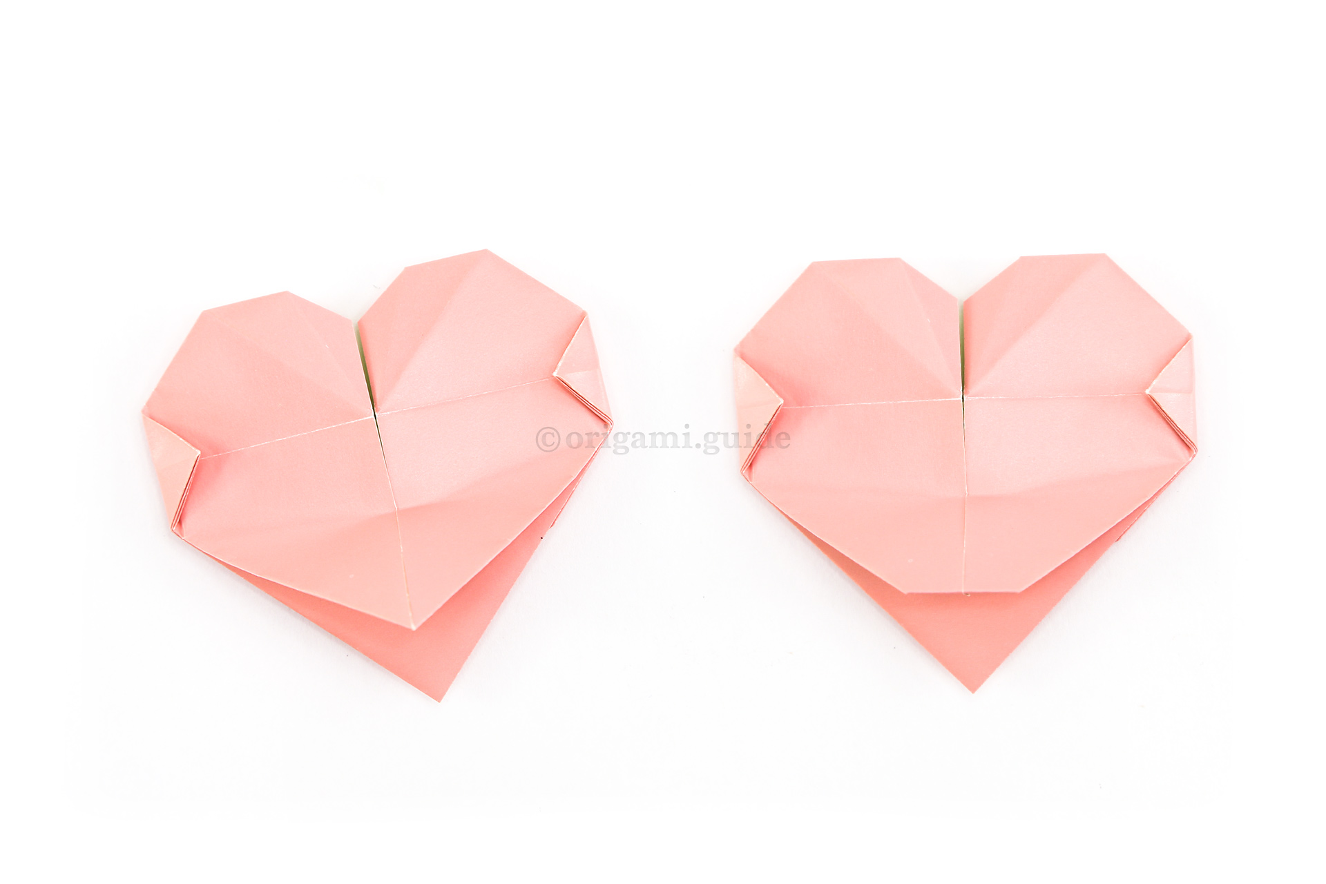 30. If you would like your heart to stand upright, you can fold the back flap up a little. Then fold the bottom point under to create a stand.