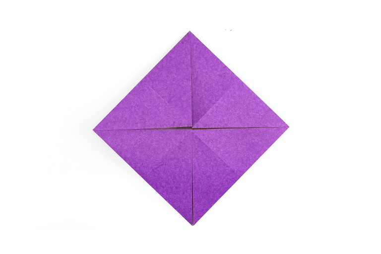 Now fold all of the other corners to the middle point.
