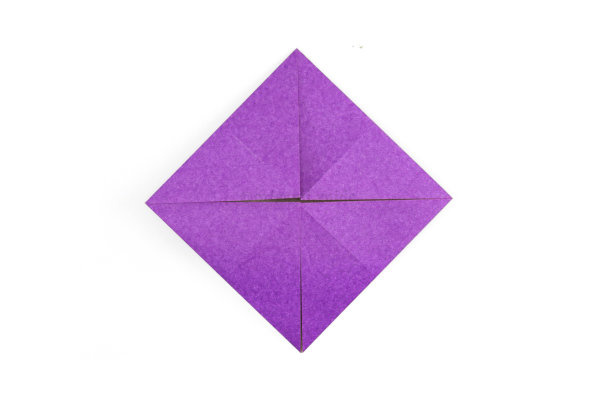 Now fold all of the other corners to the middle point.