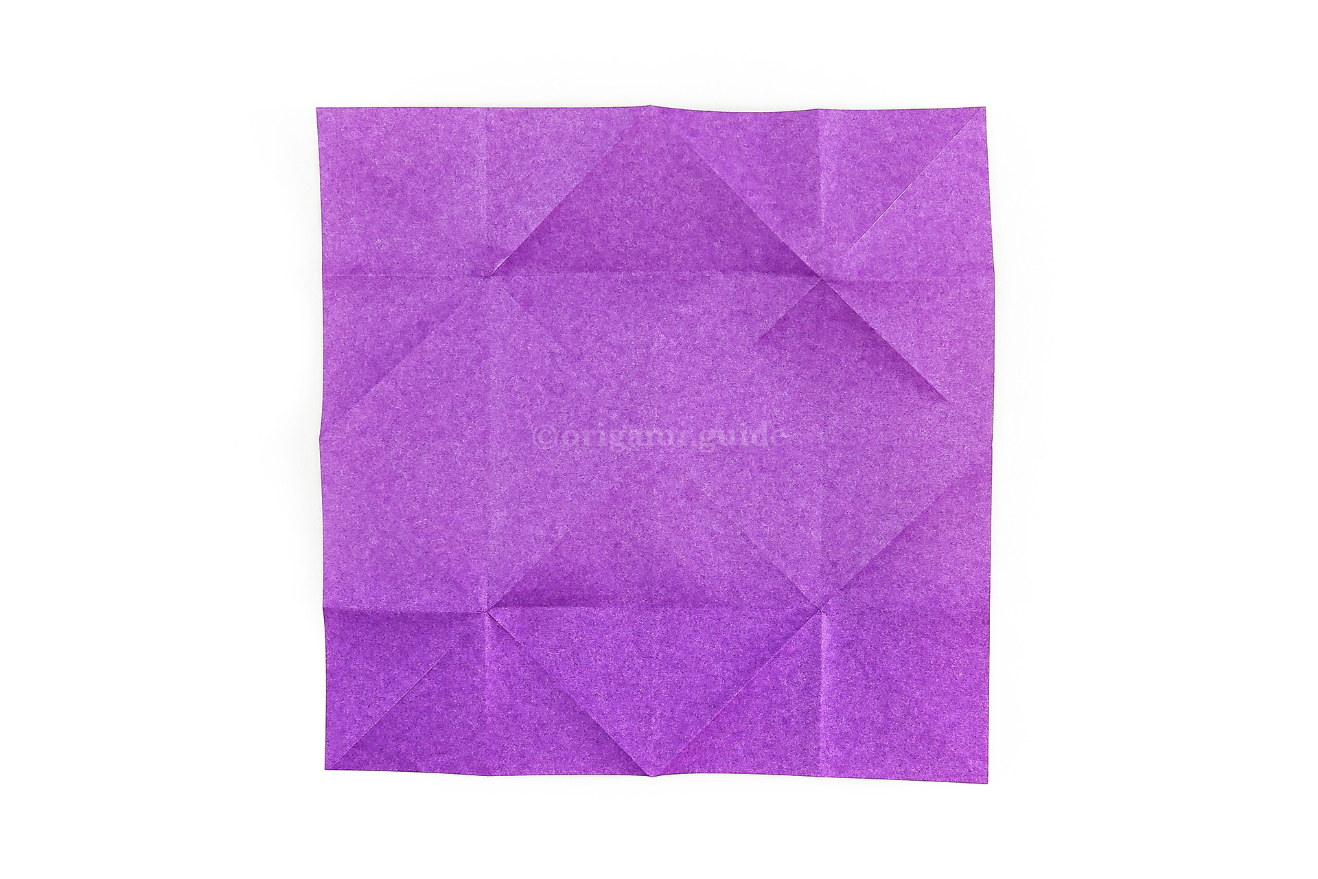 Unfold the paper completely.