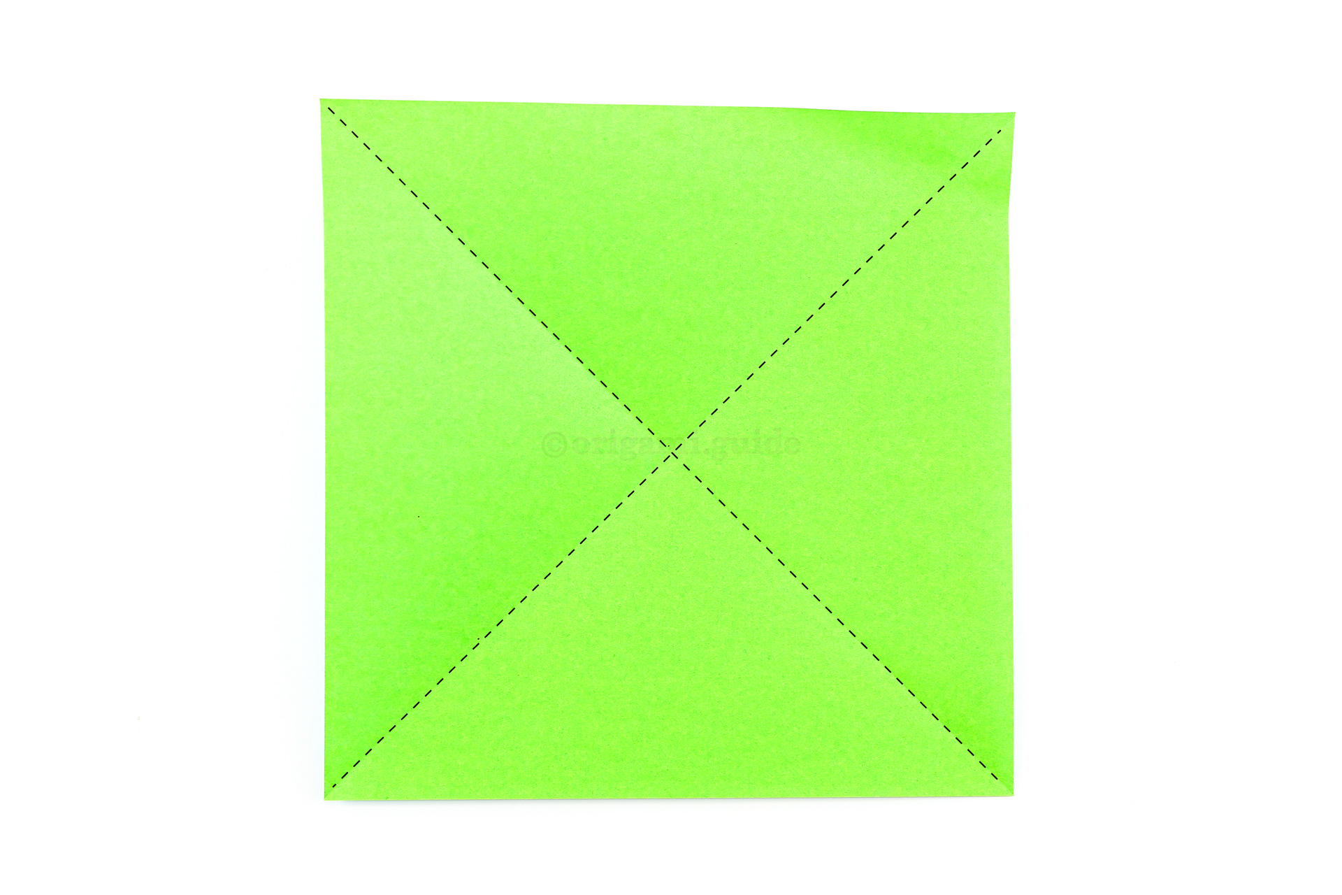 Make diagonal creases here.