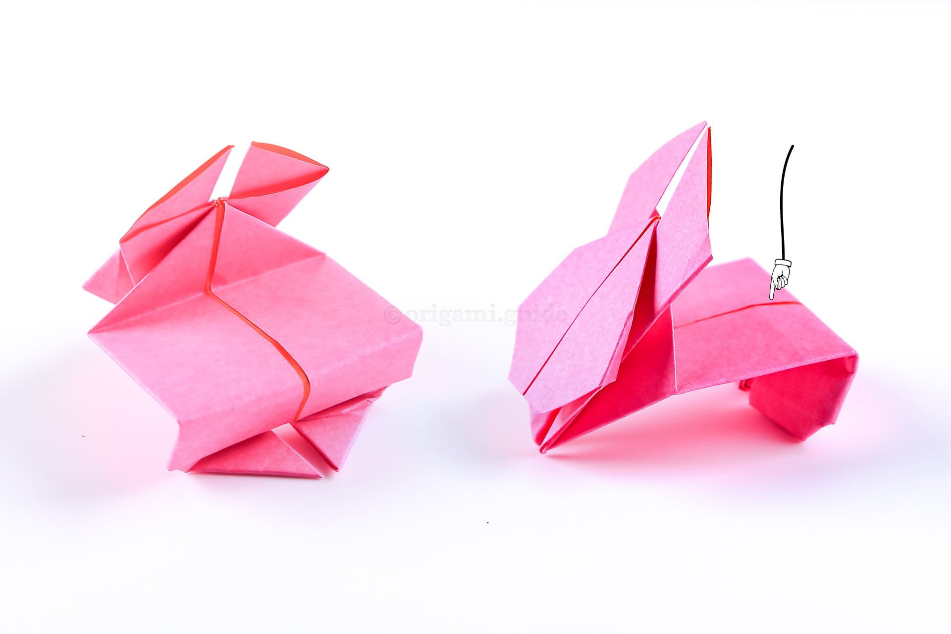 To make your origami rabbit hop, rest it on the table in this position and lightly swipe the rabbits bottom!