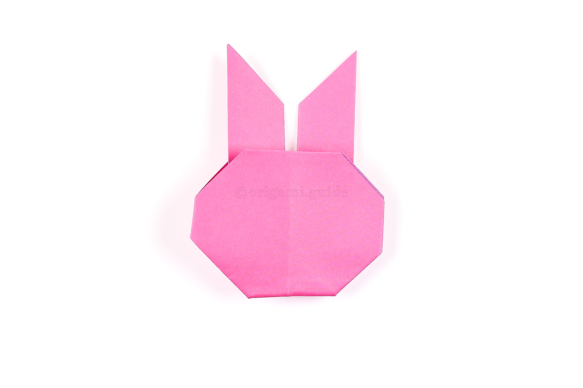 Fold the sides of the bunny face behind.