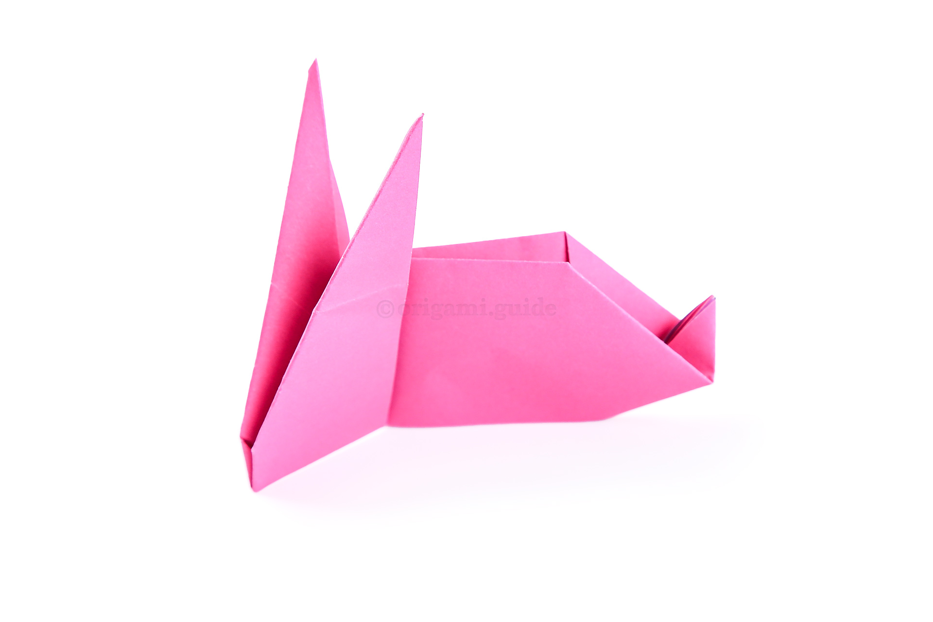 If you'd like your origami sleeping rabbit to stand up, make a crease at the neck.