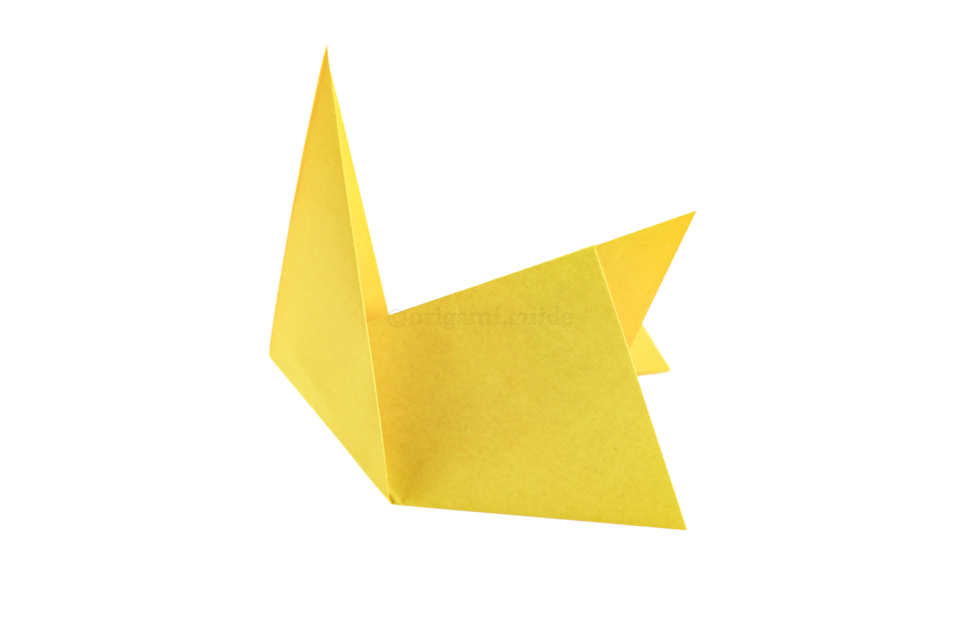 The simple origami rabbit is complete, you can make a cute face by drawing eyes, a nose and whiskers.