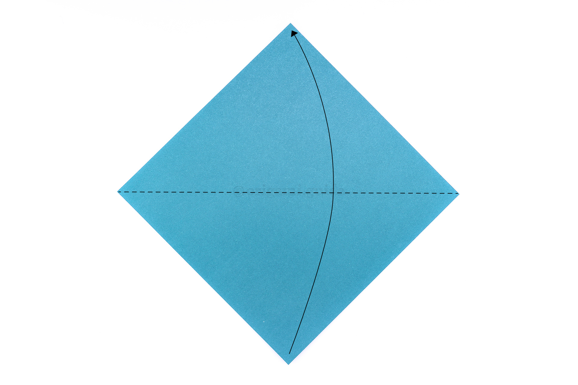 Flip the paper over to the back side of the paper. Fold the bottom point up to the top point.