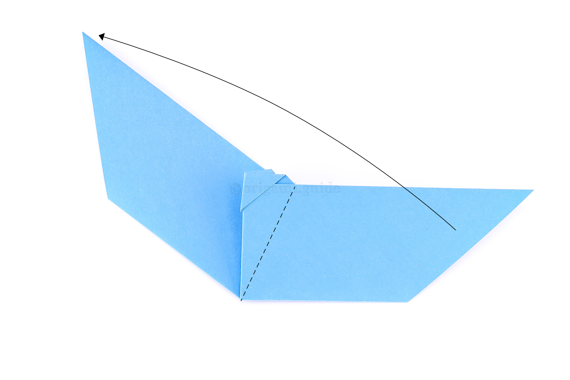 Flip the bat over to the other side. Fold the other wing diagonally up. to the left to match up with the previous wing.