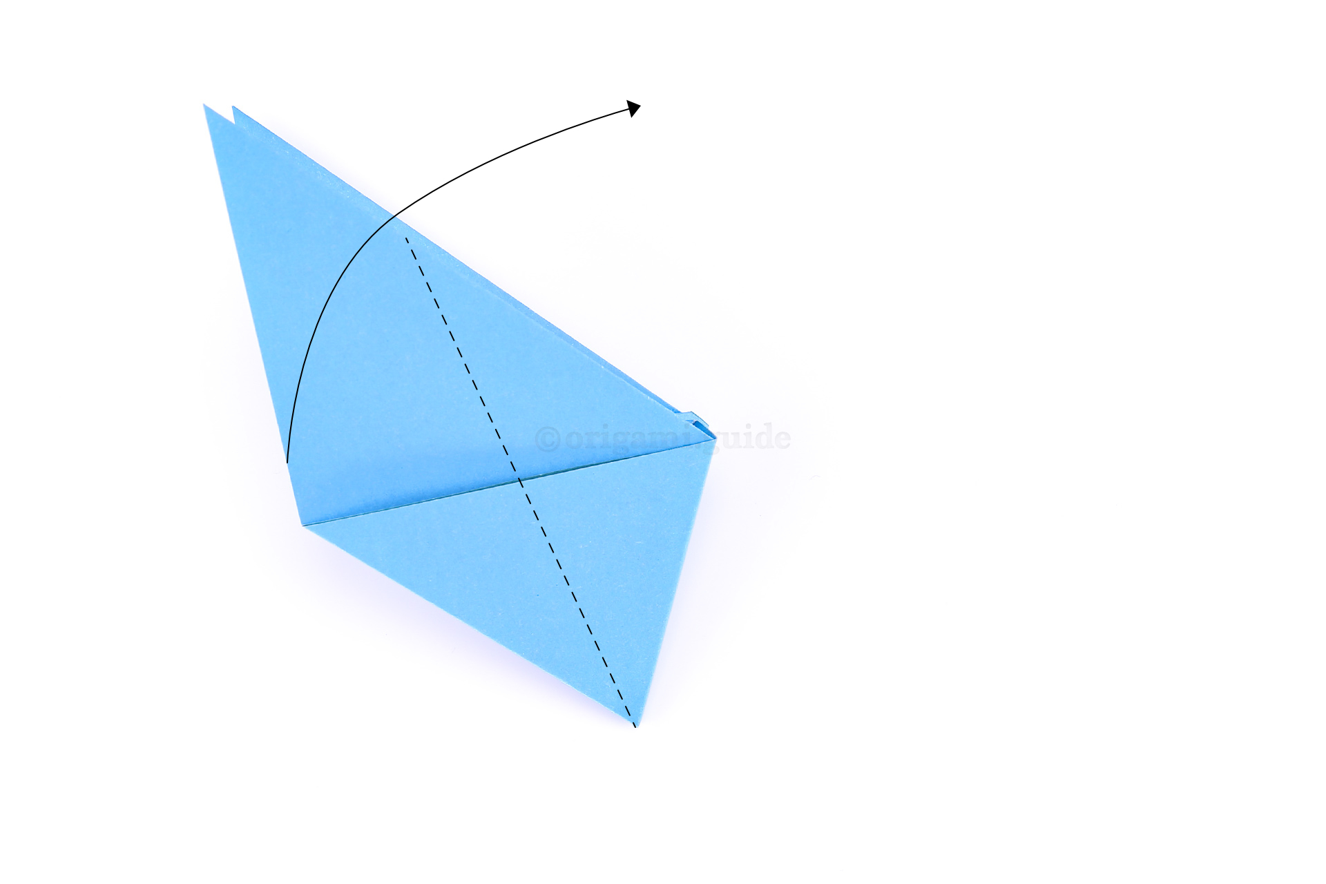 Next, fold the wing again diagonally. Please look to the next image to see what it should look like.