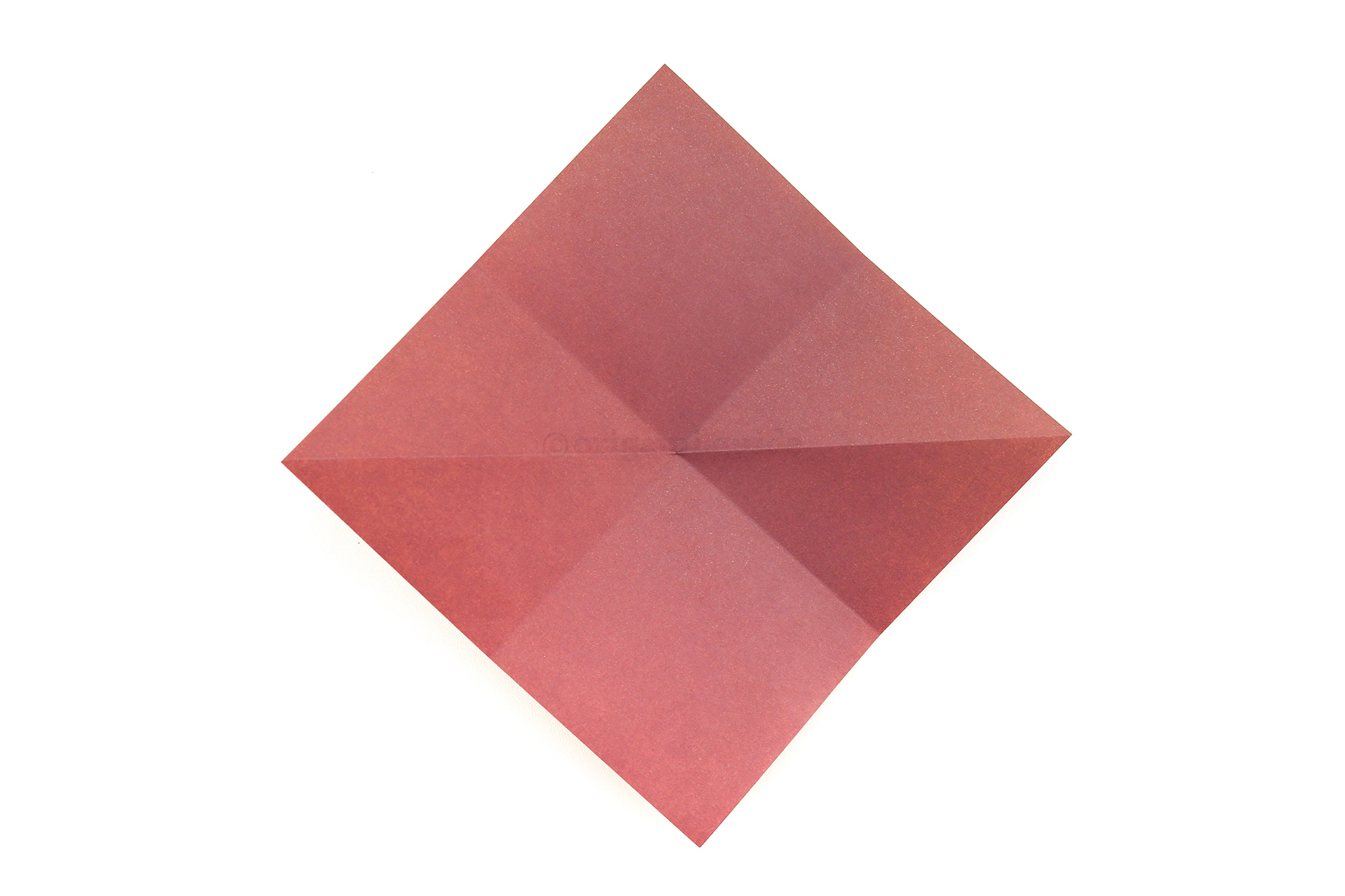 Flip the paper over to the other side.