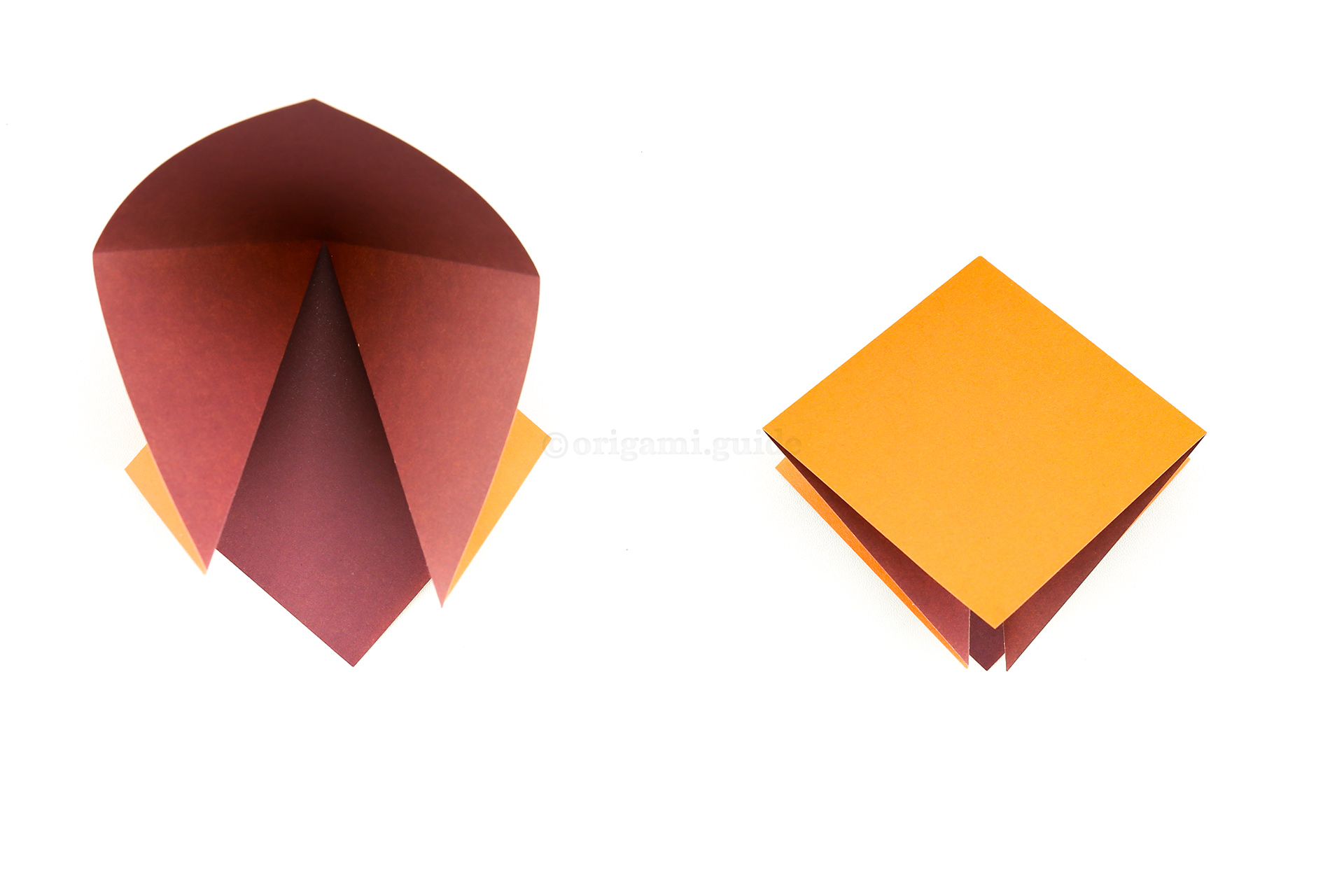 Pushing the centre of the paper, bring the right and left sides of the paper inwards and down. This is an origami square base.