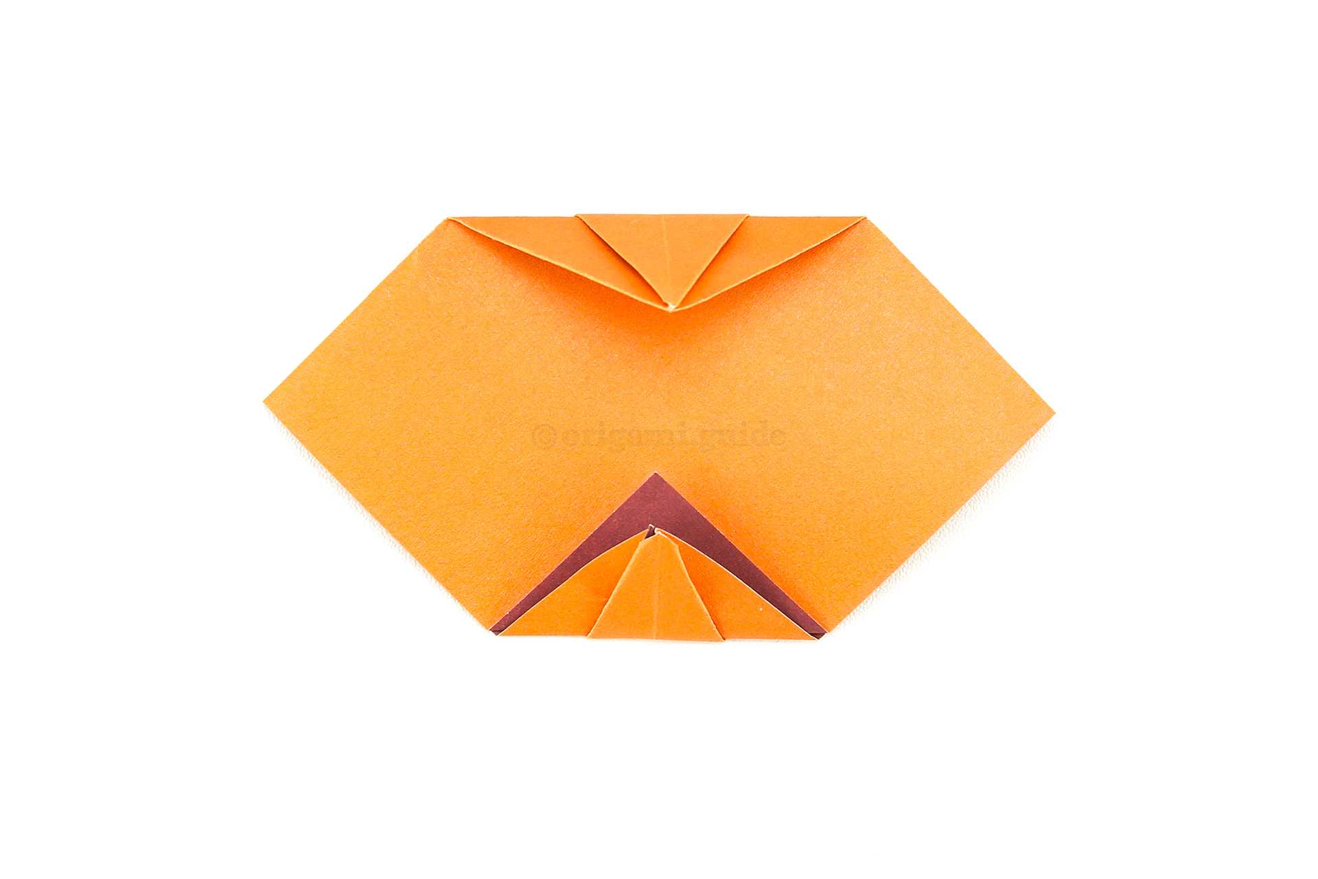 Flip the paper over to the other side.