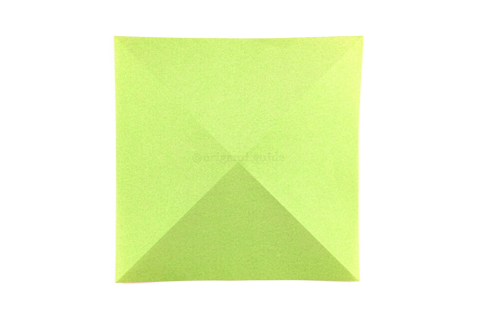 Step 7 - Flip the paper over to the other side.