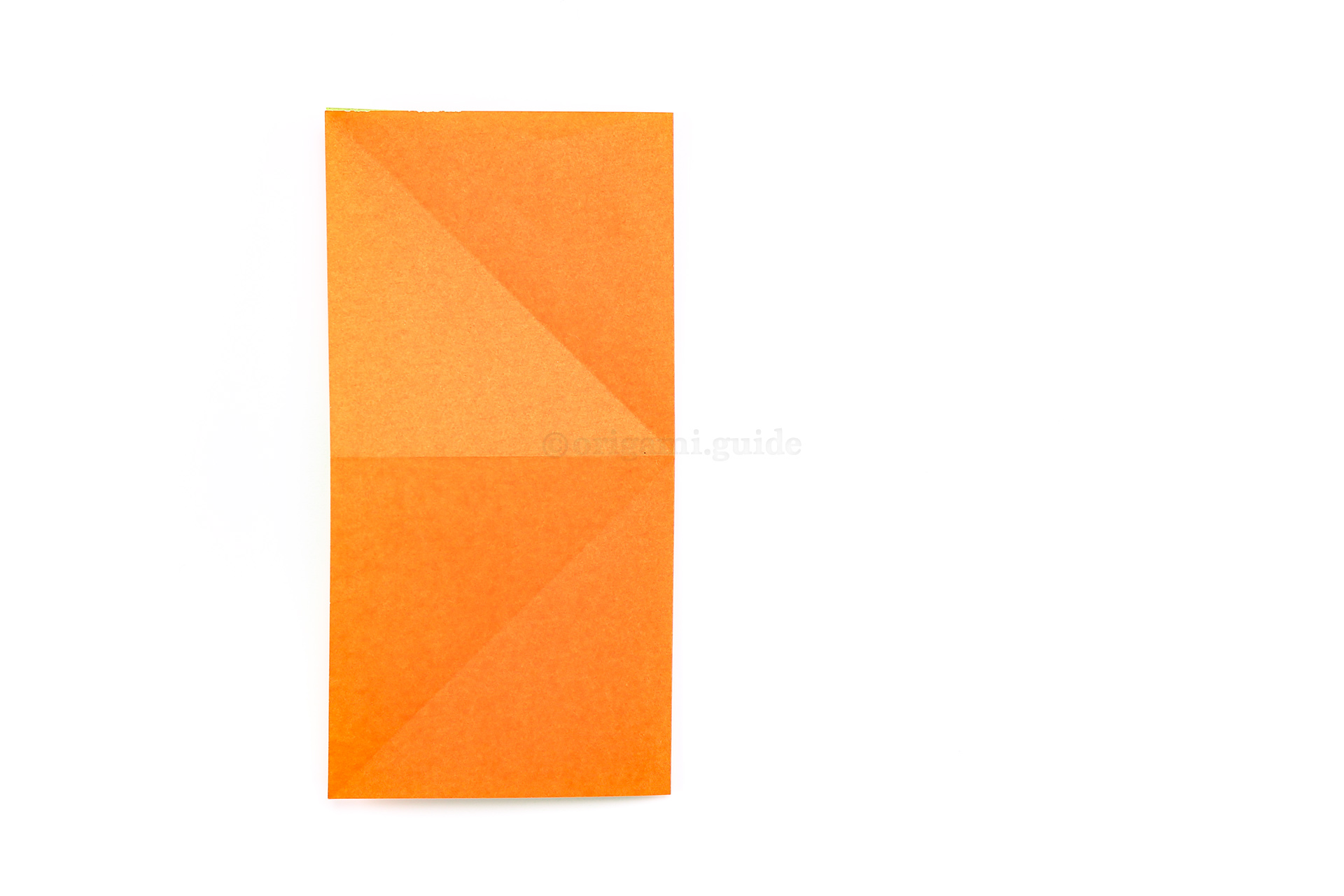 Step 10 - Next, fold the right edge over to the left edge.