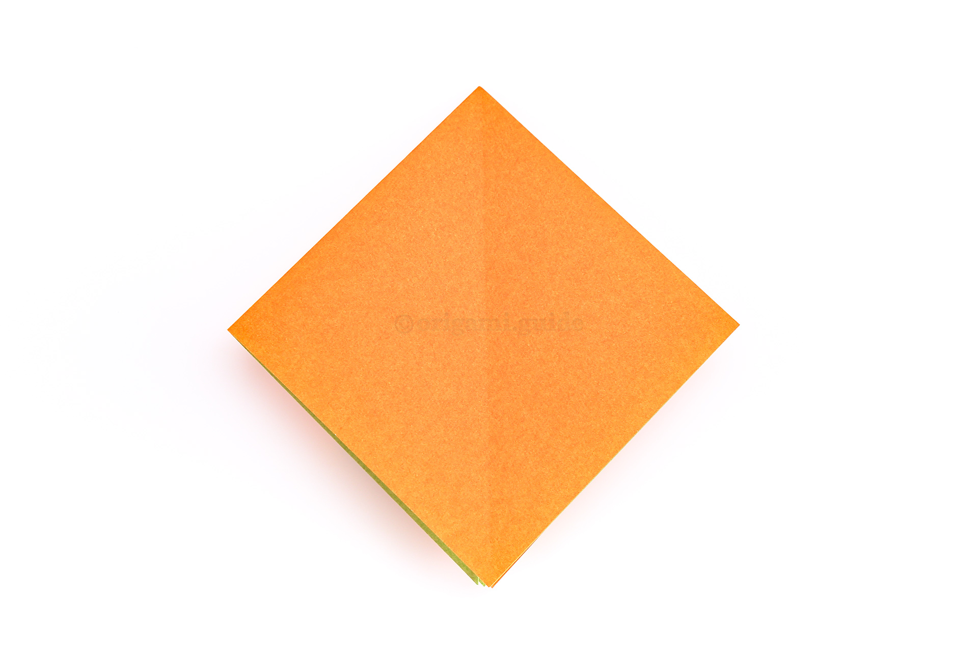 Step 17 - Flip the paper over to the other side, keeping the open ends at the bottom.