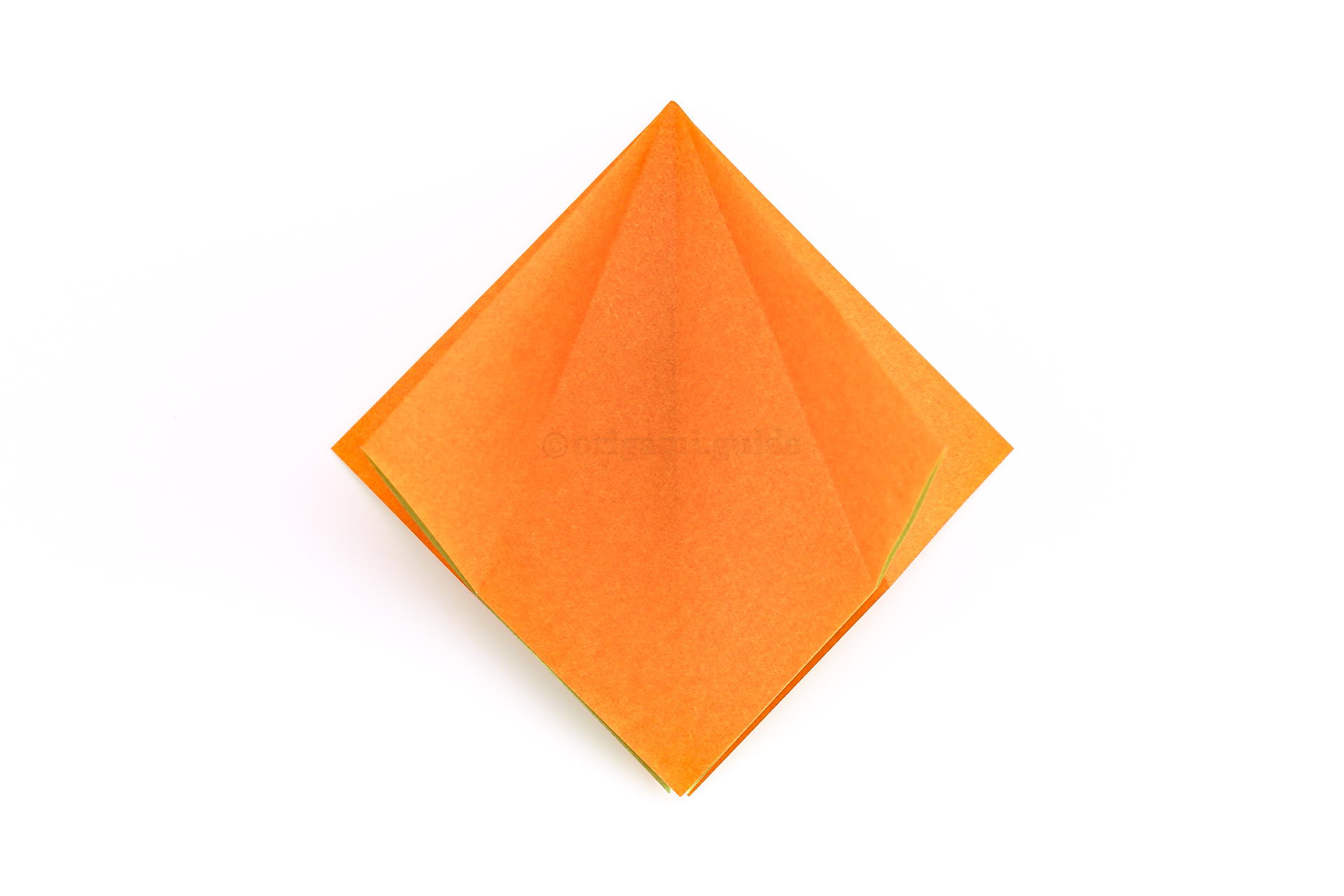 Step 20 - Unfold the last four creases, so that you are back at the square base.