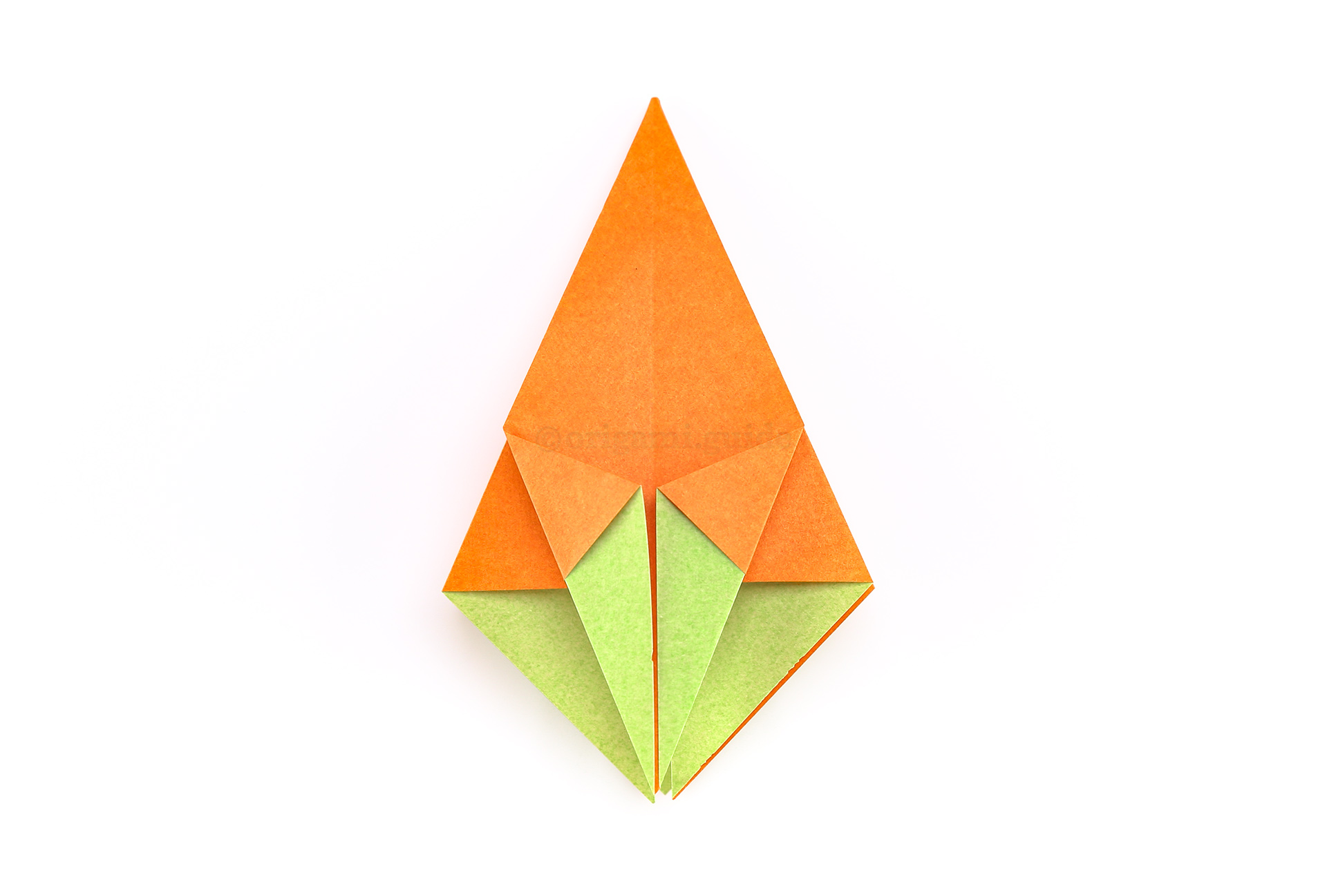 Step 24 - Focusing on the front-most flap, fold the left and right diagonal edges of it to the middle crease.