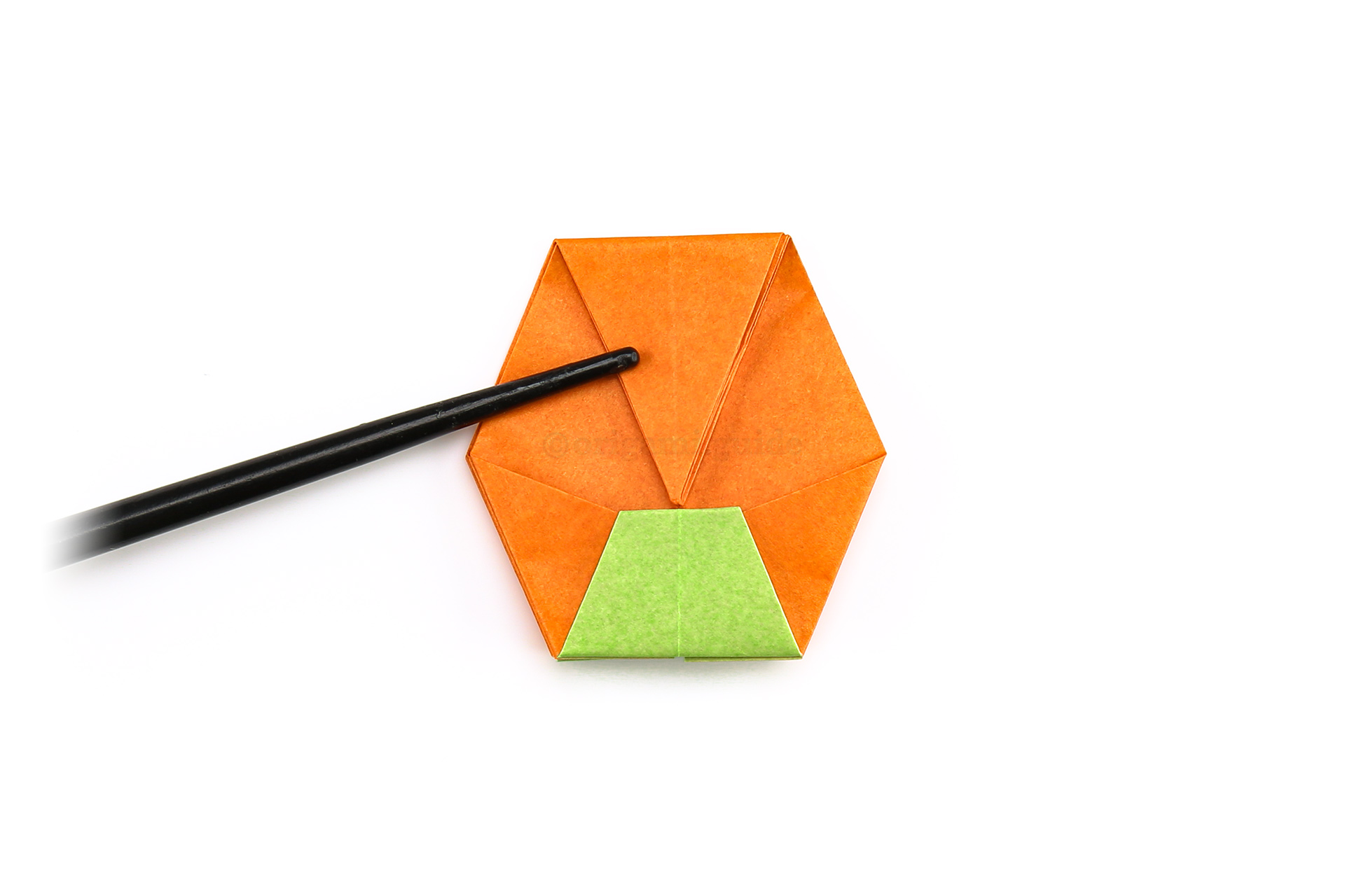 Step 30 - Create a crease by folding the top point down to the top of the lower flap.