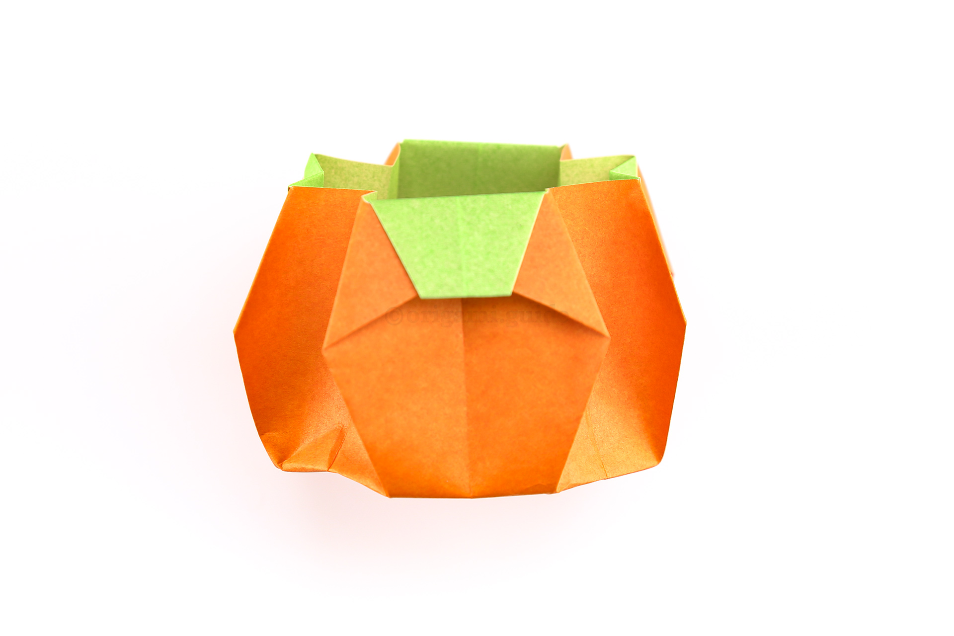 Step 35 - Here is your opportunity to draw a face on your origami pumpkin basket.