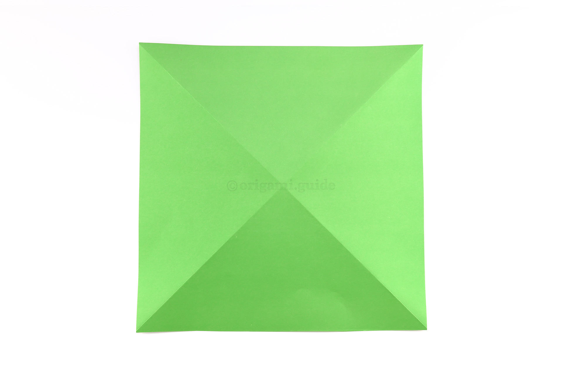 Flip the paper over to the other side.