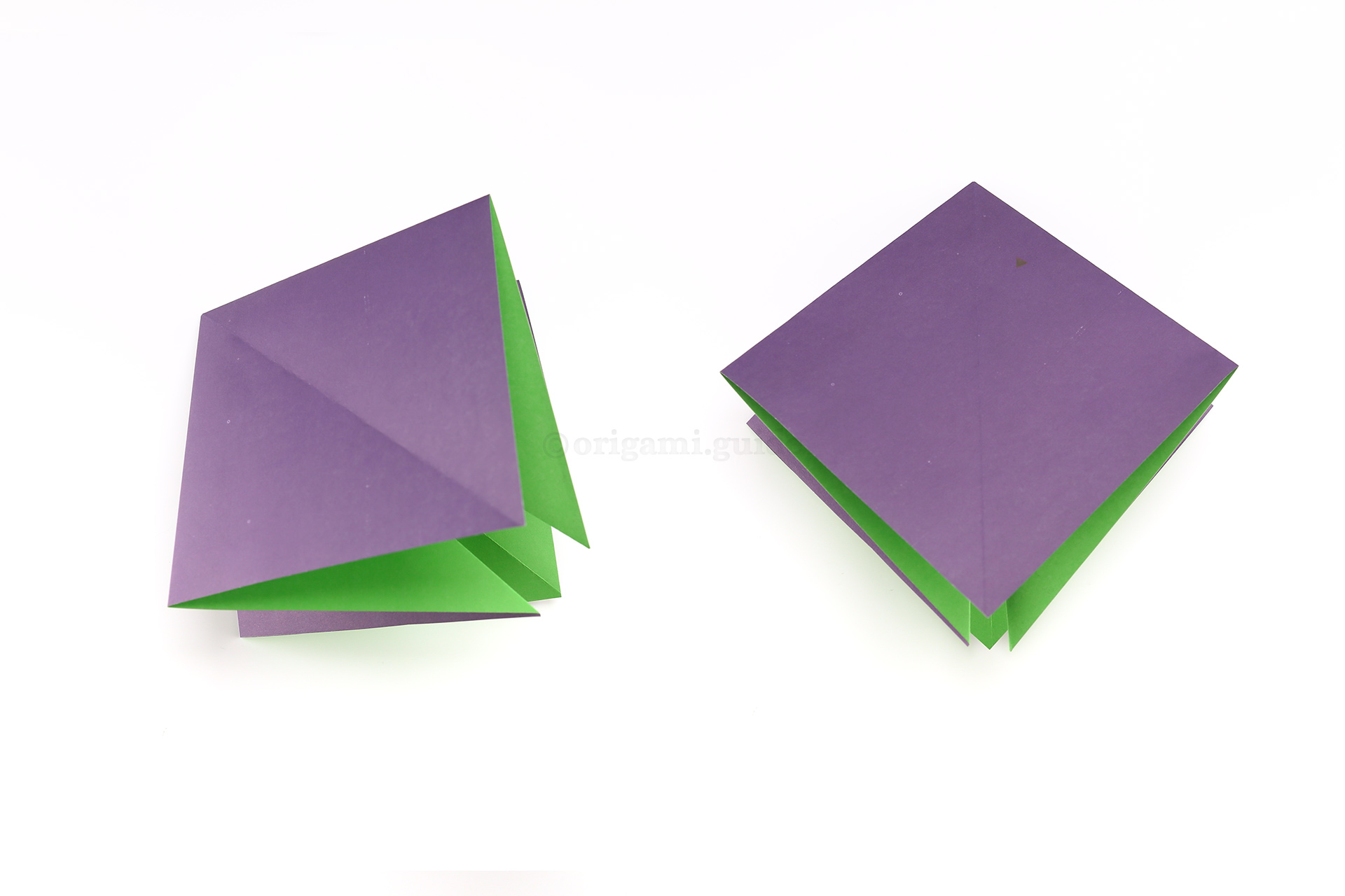 Continue to fold the paper into a square shape as shown, and then rotate the paper into a diamond position with the open end at the bottom.