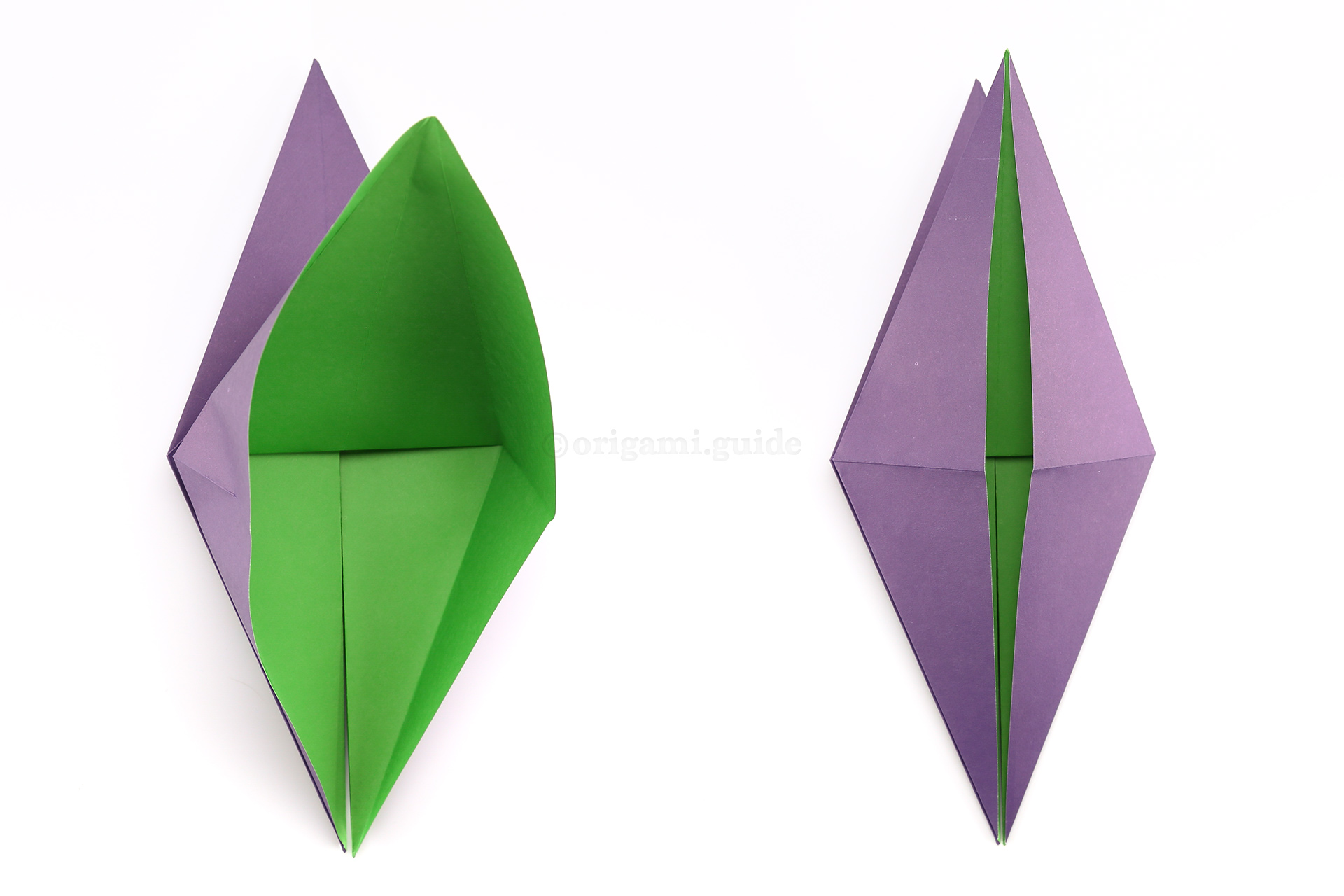 In the same way as before, open up the bottom flap from the top crease as shown, just like a bird opening its beak and flatten the paper upwards. This is an origami bird base.