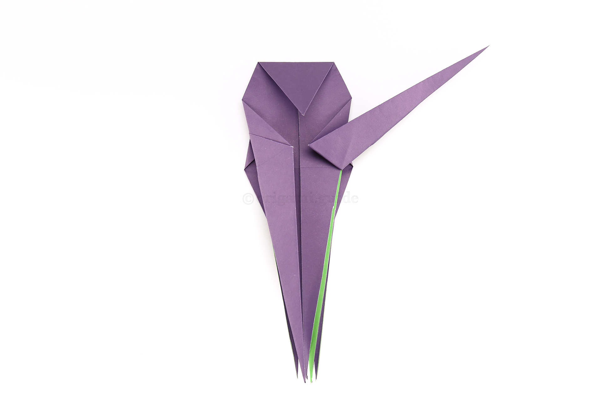 It's time to start forming the spiders legs. Fold the top-most flap from the right side, diagonally up to the right.