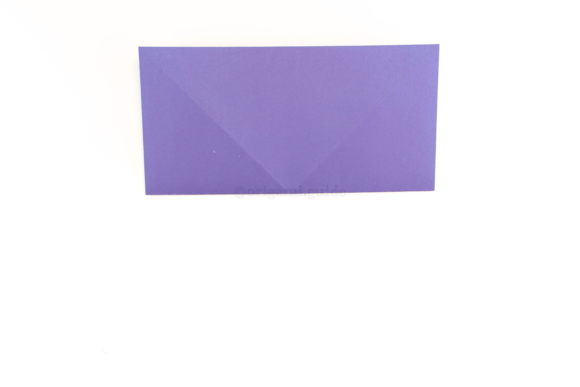 Step 7 - Next, fold the lower edge up to the top edge.