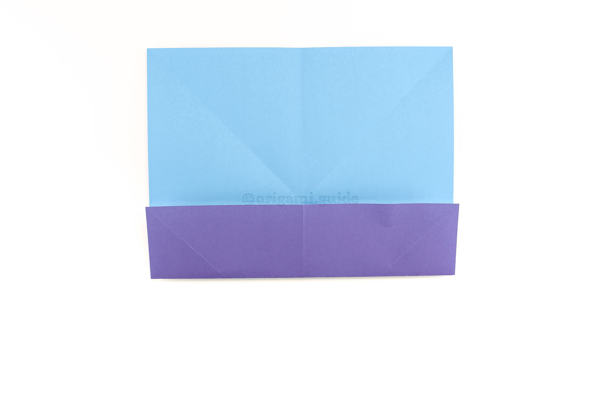 Step 11 - Fold the bottom edge up to meet the central crease.