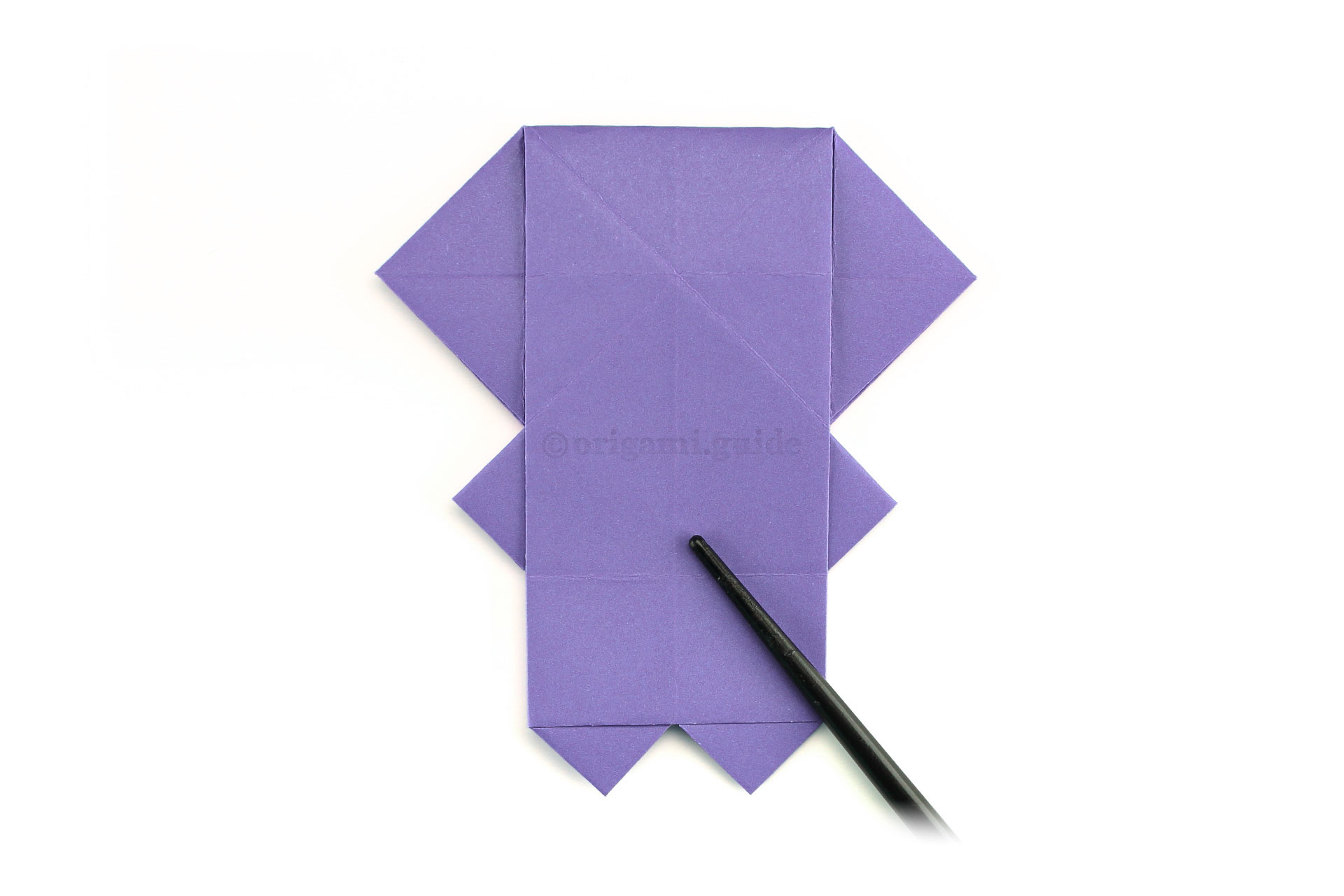 Step 38 - Flip the paper over to the other side.