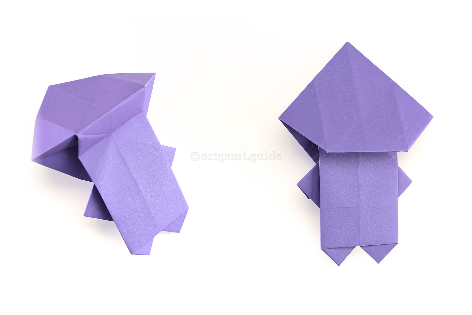 Step 39 - Fold the top section down whilst bringing the flap up from behind.