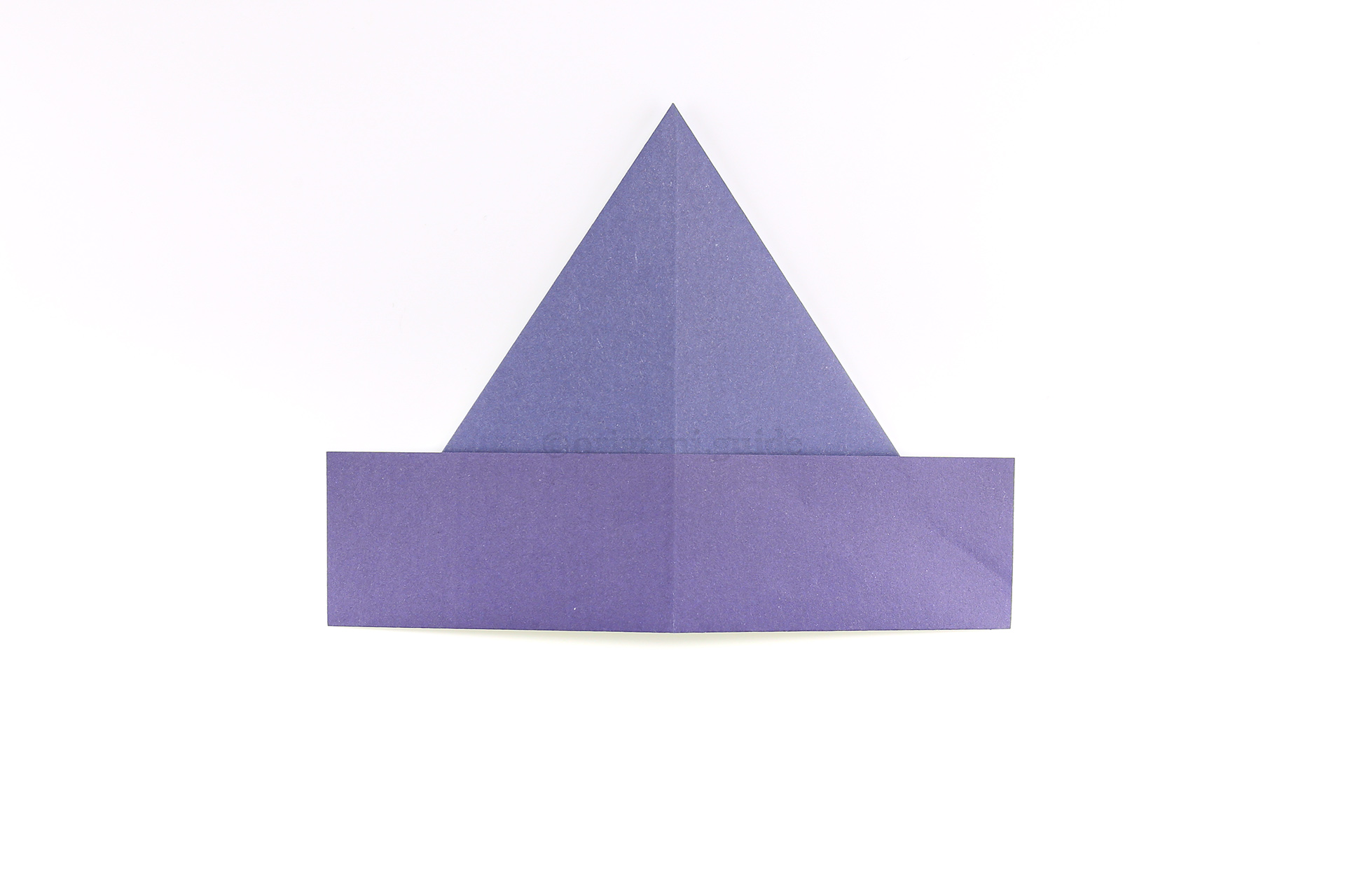 Step 10 - Flip the origami witches hat over to the other side, and it's complete!