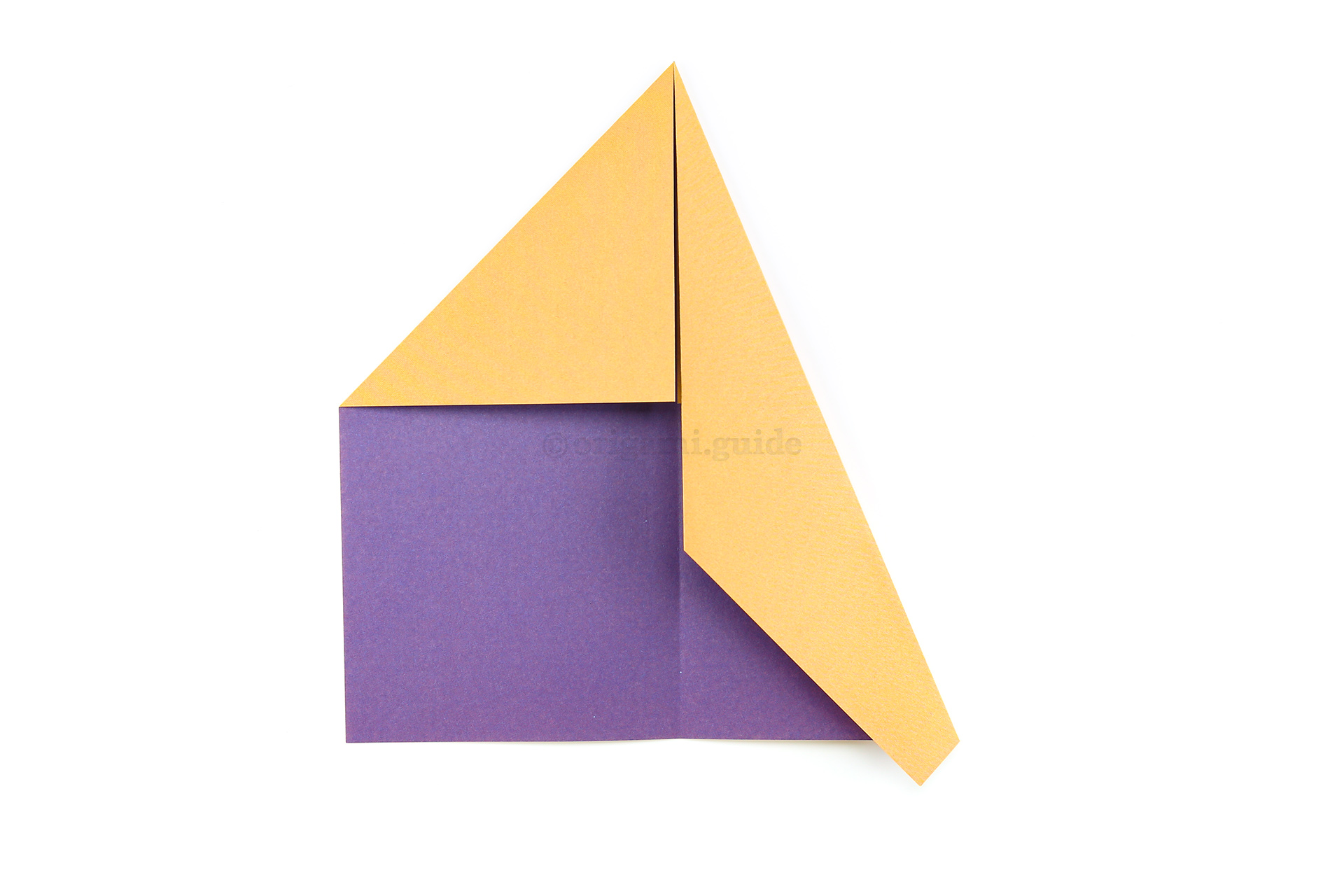 Step 6 - Fold the right edge down again diagonally to meet the central crease.