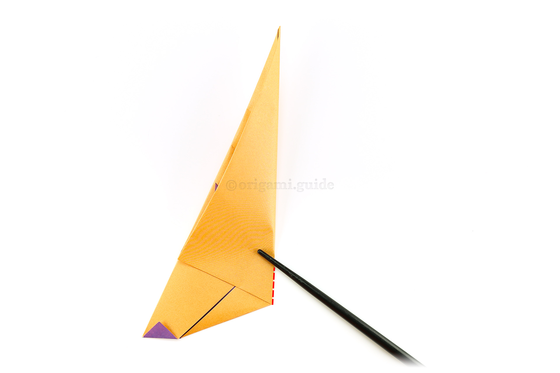 Step 10 - Next, fold the paper in half, only creating a crease in the lower area of the paper.