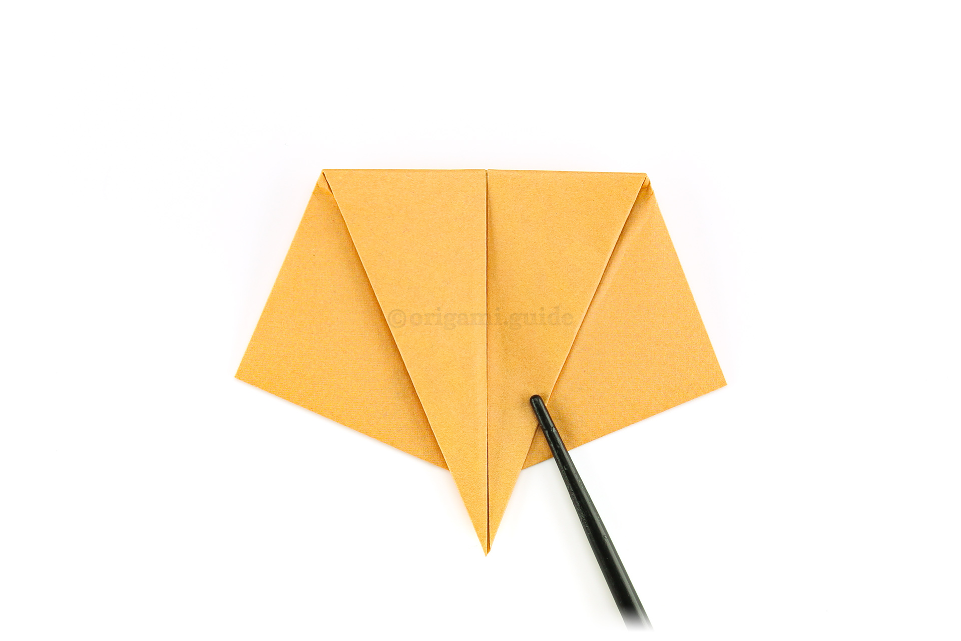 Step 21 - Fold the paper down as shown, the top point should overlap a little.