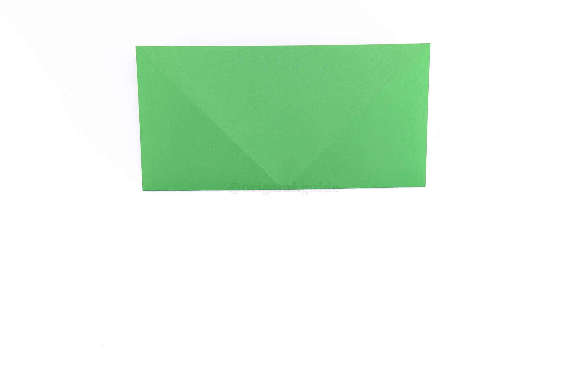 Step 7 - Next, fold the lower edge up to the top edge.