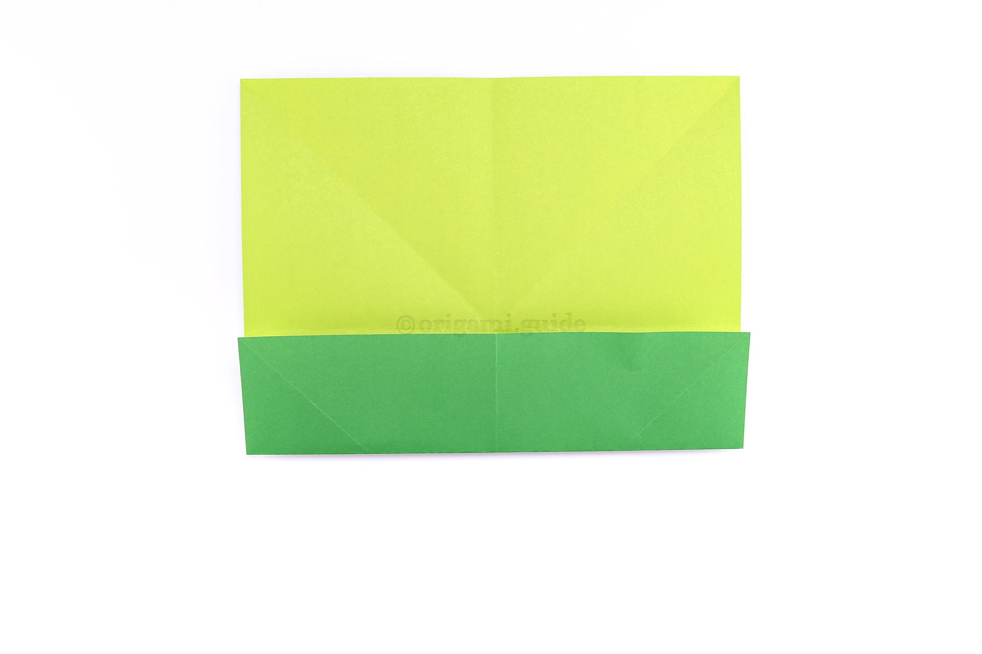 Step 11 - Fold the bottom edge up to meet the central crease.