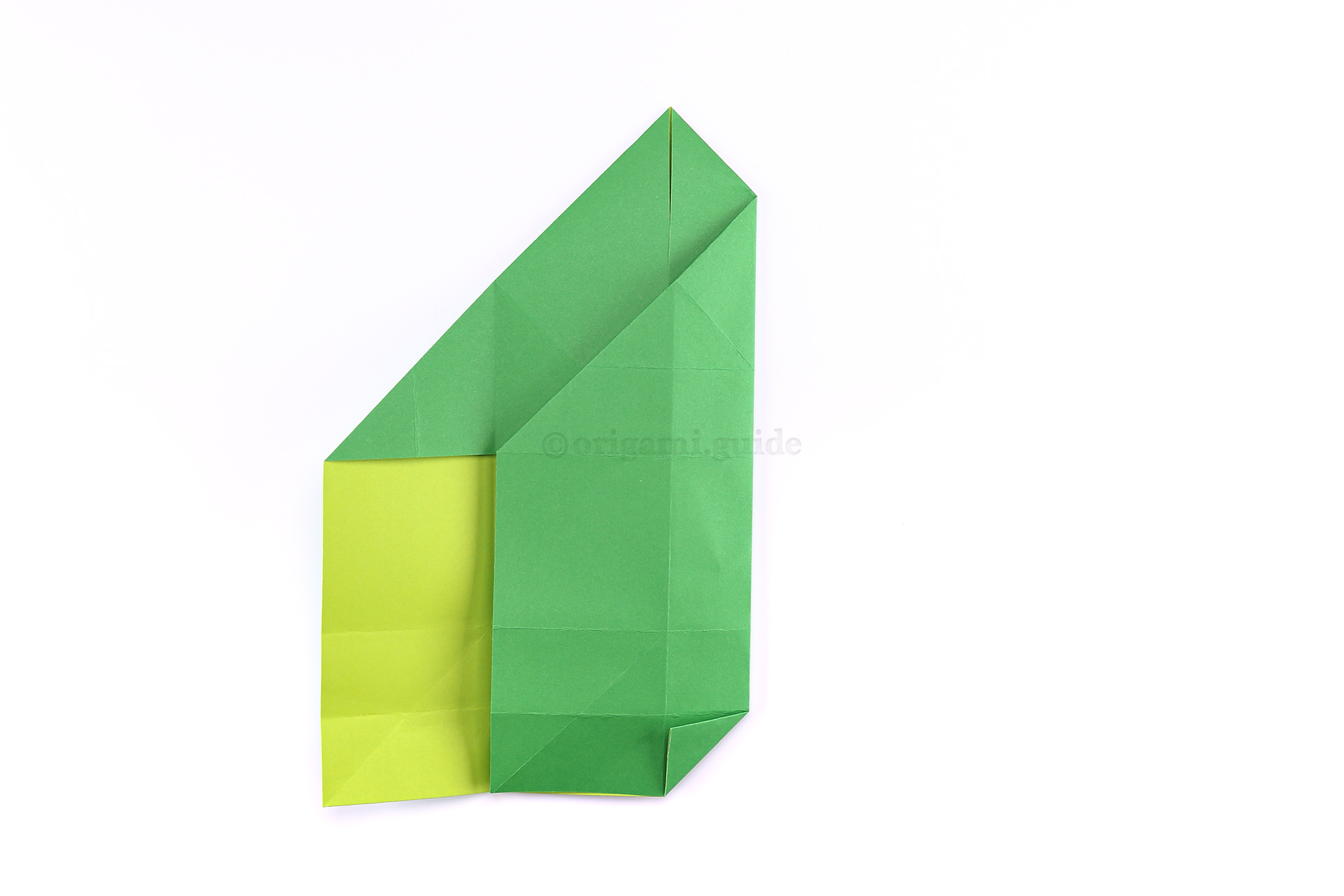 Step 19 - Next, fold the lower right corner diagonally as shown, crease well.
