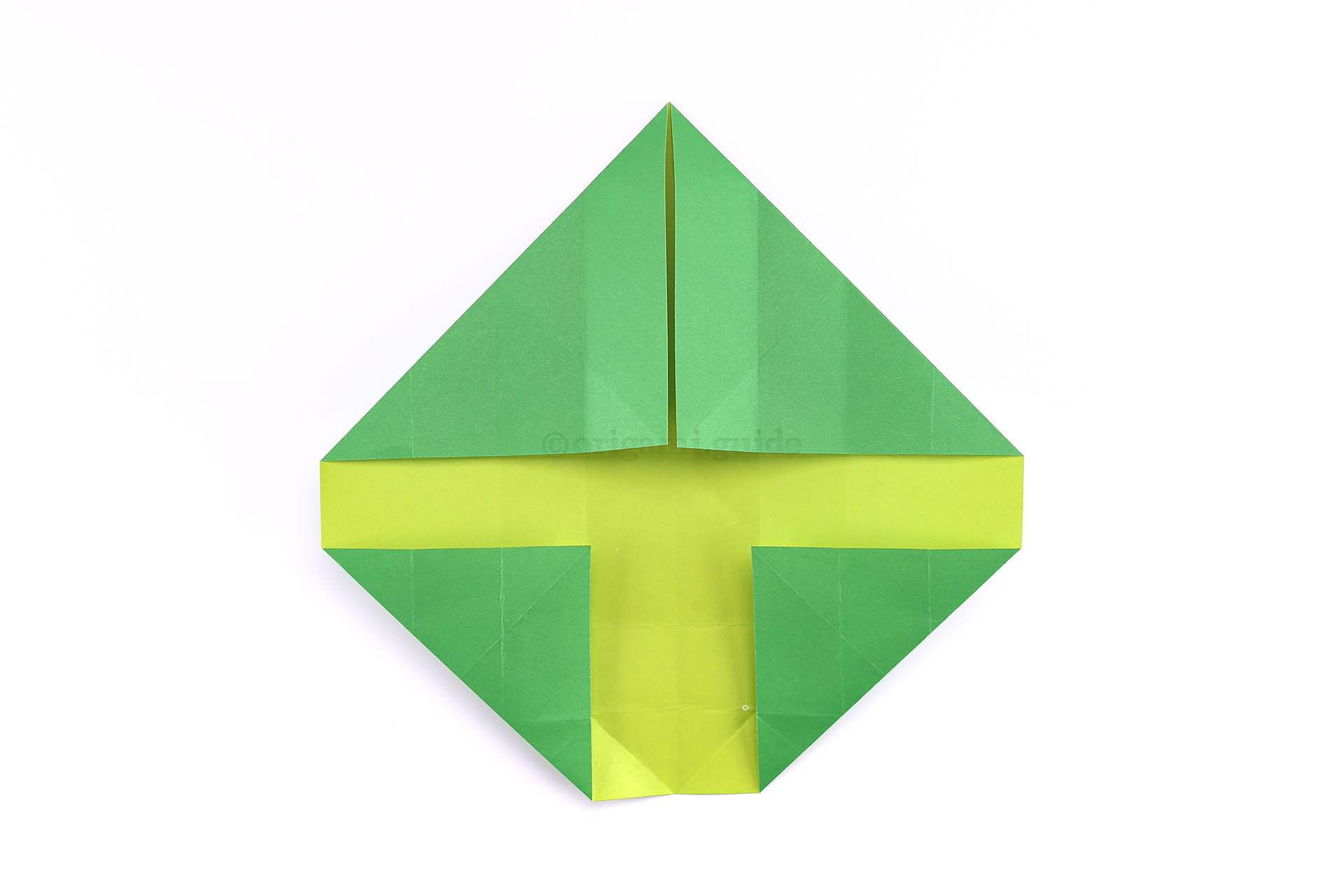 Step 23 - Unfold the last couple of steps, and then fold the lower left and right corners diagonally as shown.